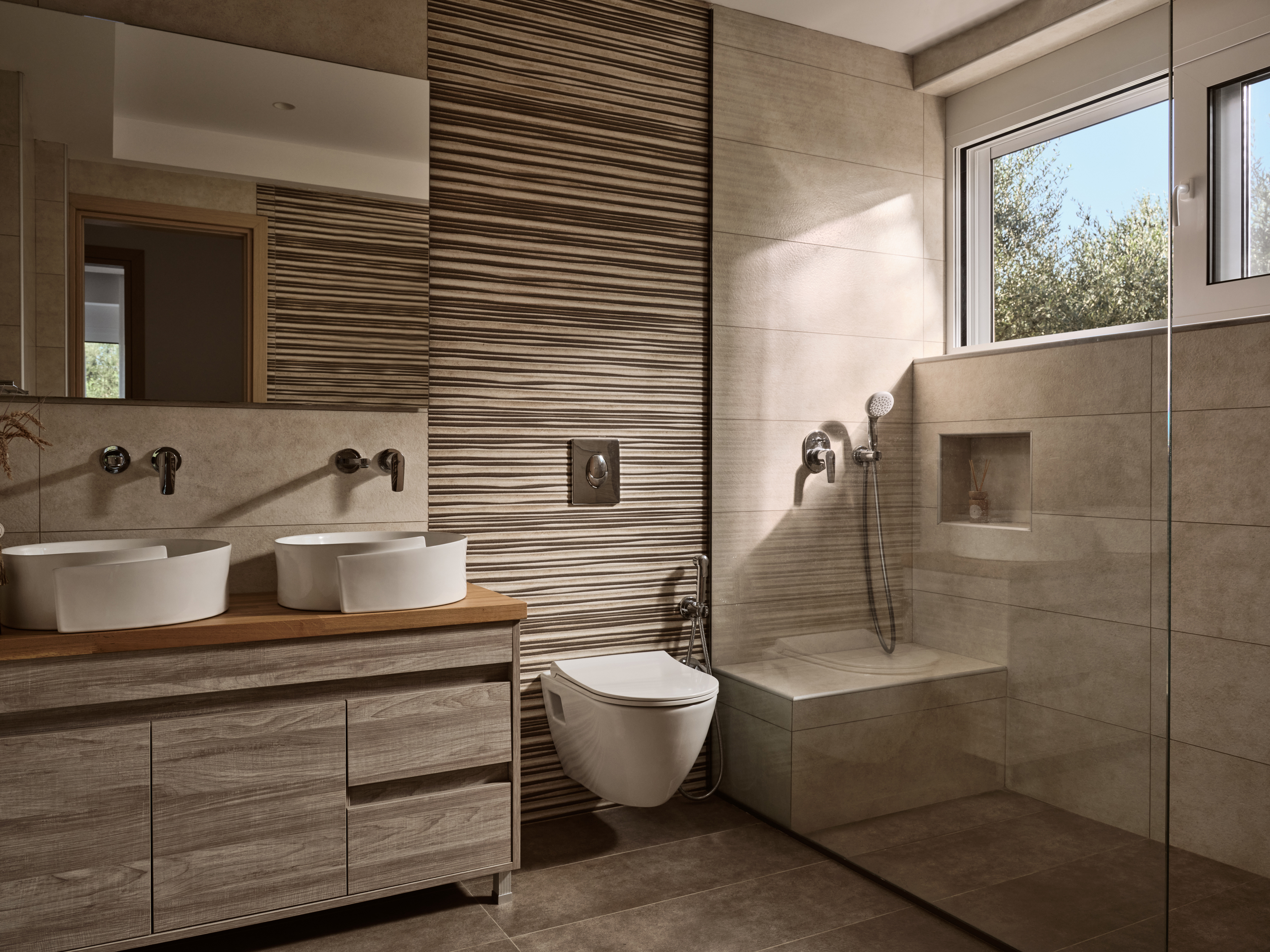 Spacious bathroom with double sink & walk in shower.