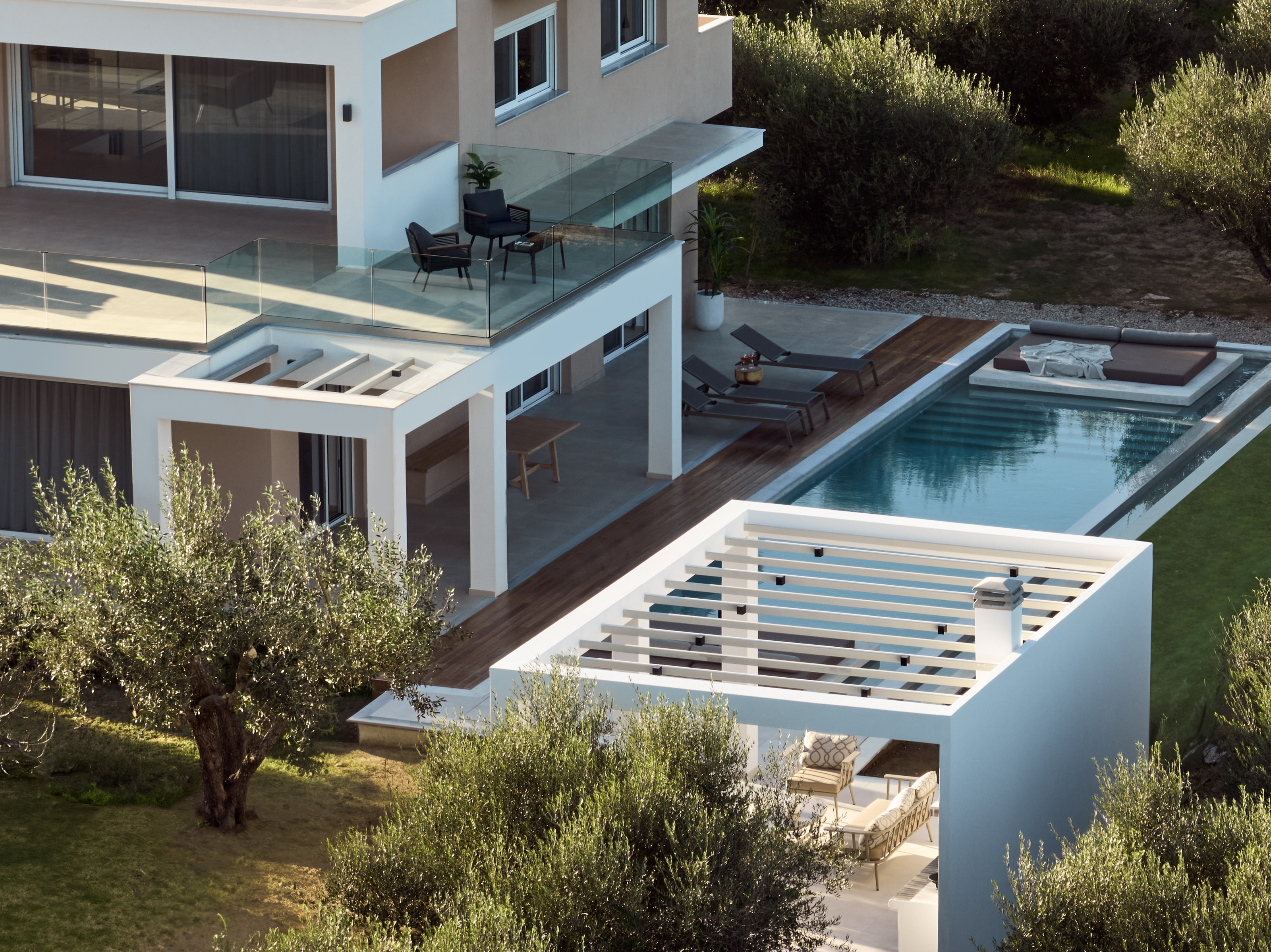 Tranquility unfold at the 50m2 pool area, featuring swim up sun-beds.